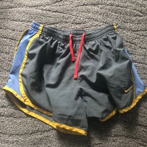 Nike gray, blue, and yellow athletic shorts